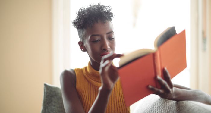 image of a Black person reading.jpg.optimal