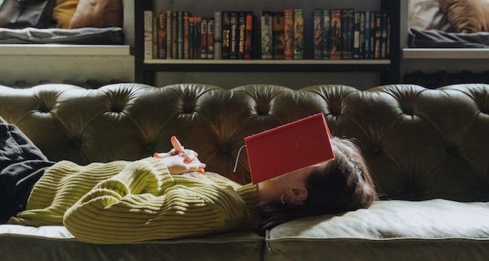 woman with book over her face 1280x720 1.jpeg.optimal