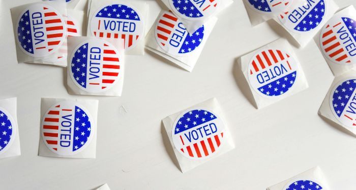 scattered I Voted stickers with American flag design.jpg.optimal